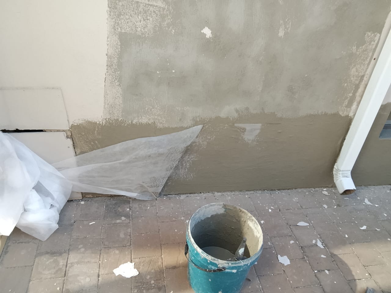 unpainted wall after minor crack repairs