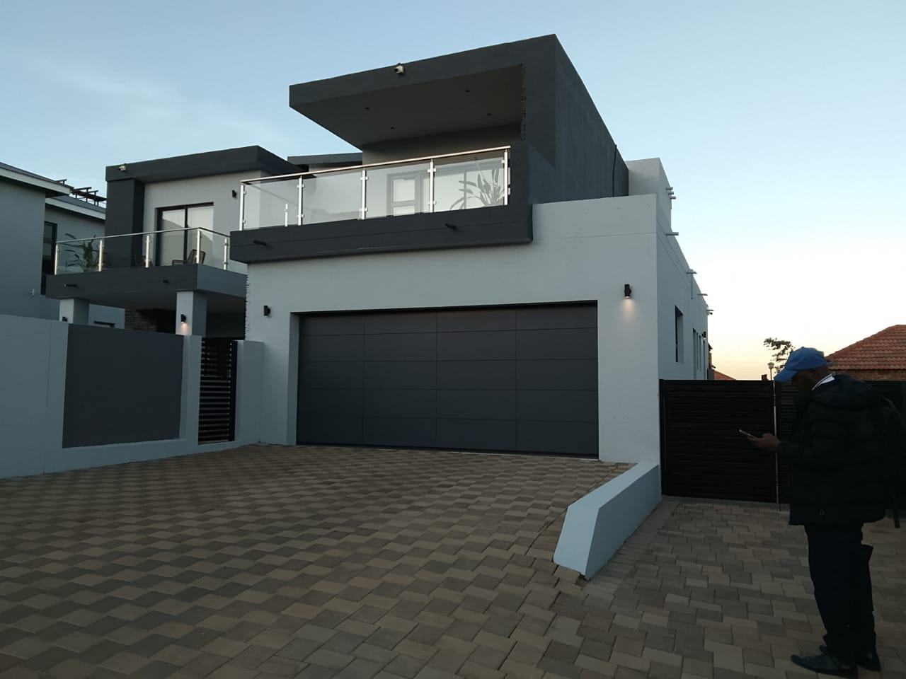 freshly painted house exterior. Garage door view